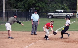 Michael Murray/Americus Times-Recorder: Mary Martin Sheely attempts to beat the ball to third base in the Lady Raiders’ first match of the afternoon on Oct. 7.